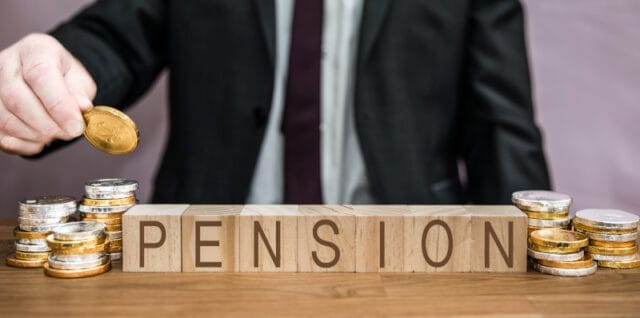 Pension concept with businessman saving for a pension pot